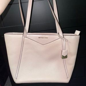 Rose gold Michael Kors purse